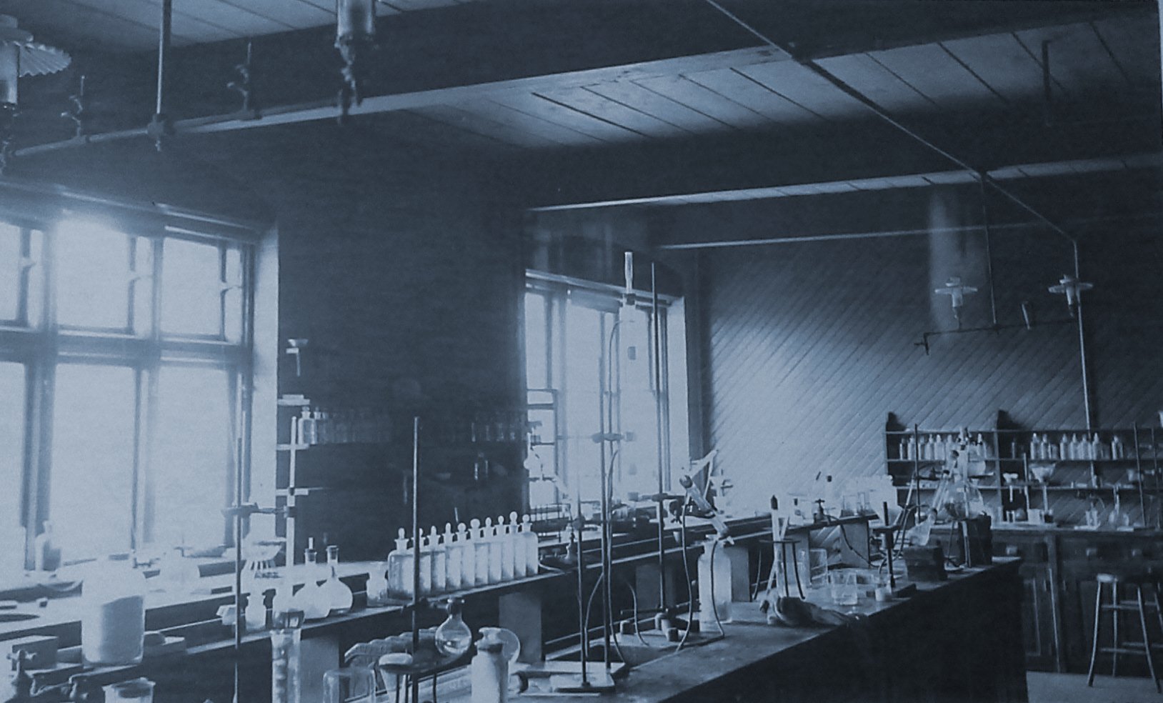 Second slide; Photograph of a chemistry Lab c. 1900 at Bryn Mawr College.